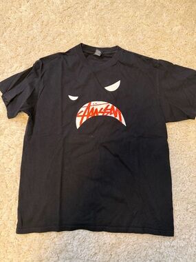 Stussy Black Crewneck Tee with White Logo Tag